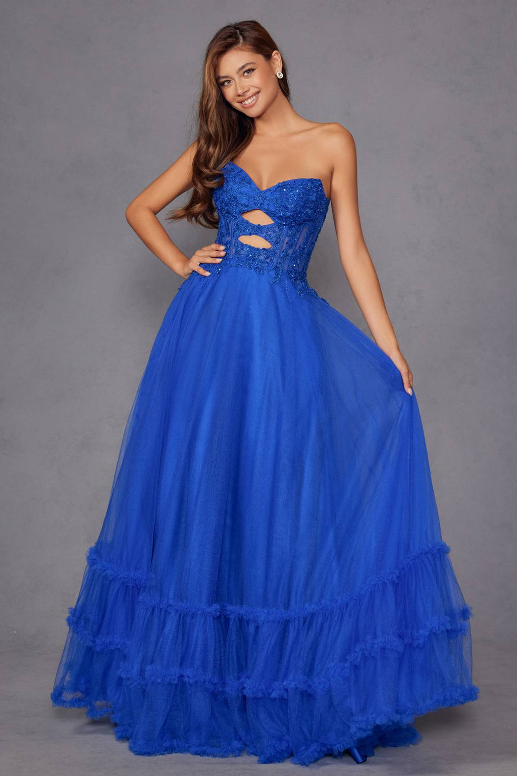 Blue strapless sweetheart A-line tulle gown with lace bodice and waist keyhole cutout