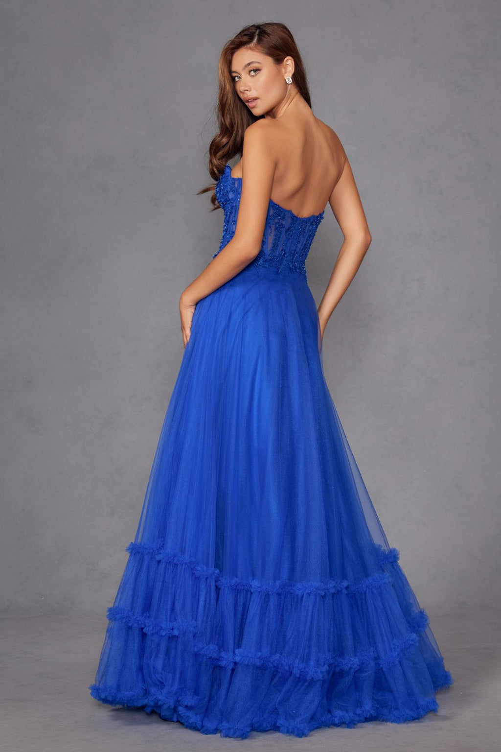 Royal blue strapless sweetheart A-line gown with fitted bodice and tiered tulle skirt