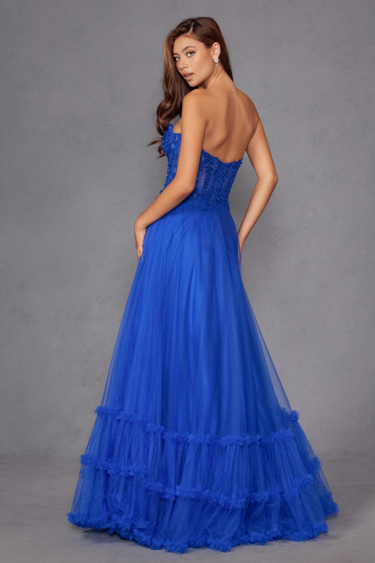 Royal blue strapless sweetheart A-line gown with fitted bodice and tiered tulle skirt