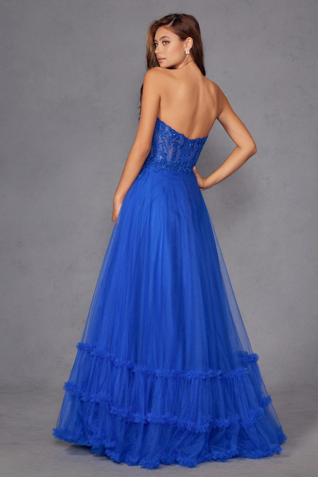 Royal blue strapless A-line tulle gown with tiered skirt and open back view