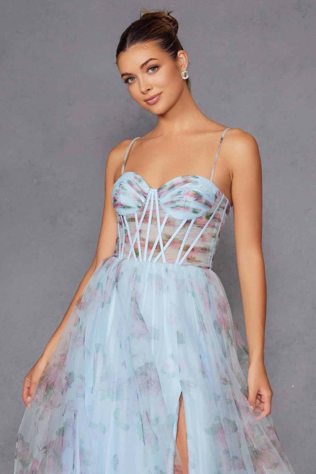 Light blue floral tulle gown with sweetheart neckline and crisscross corset bodice