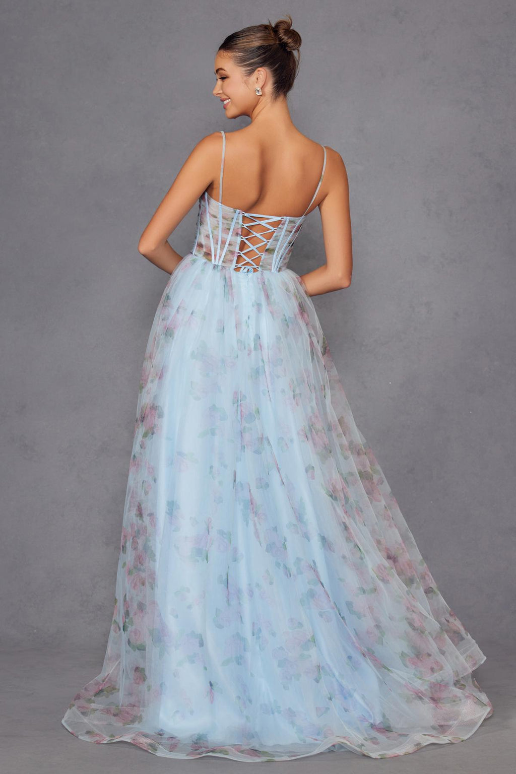 Light blue floral tulle A-line gown with open crisscross back and full skirt