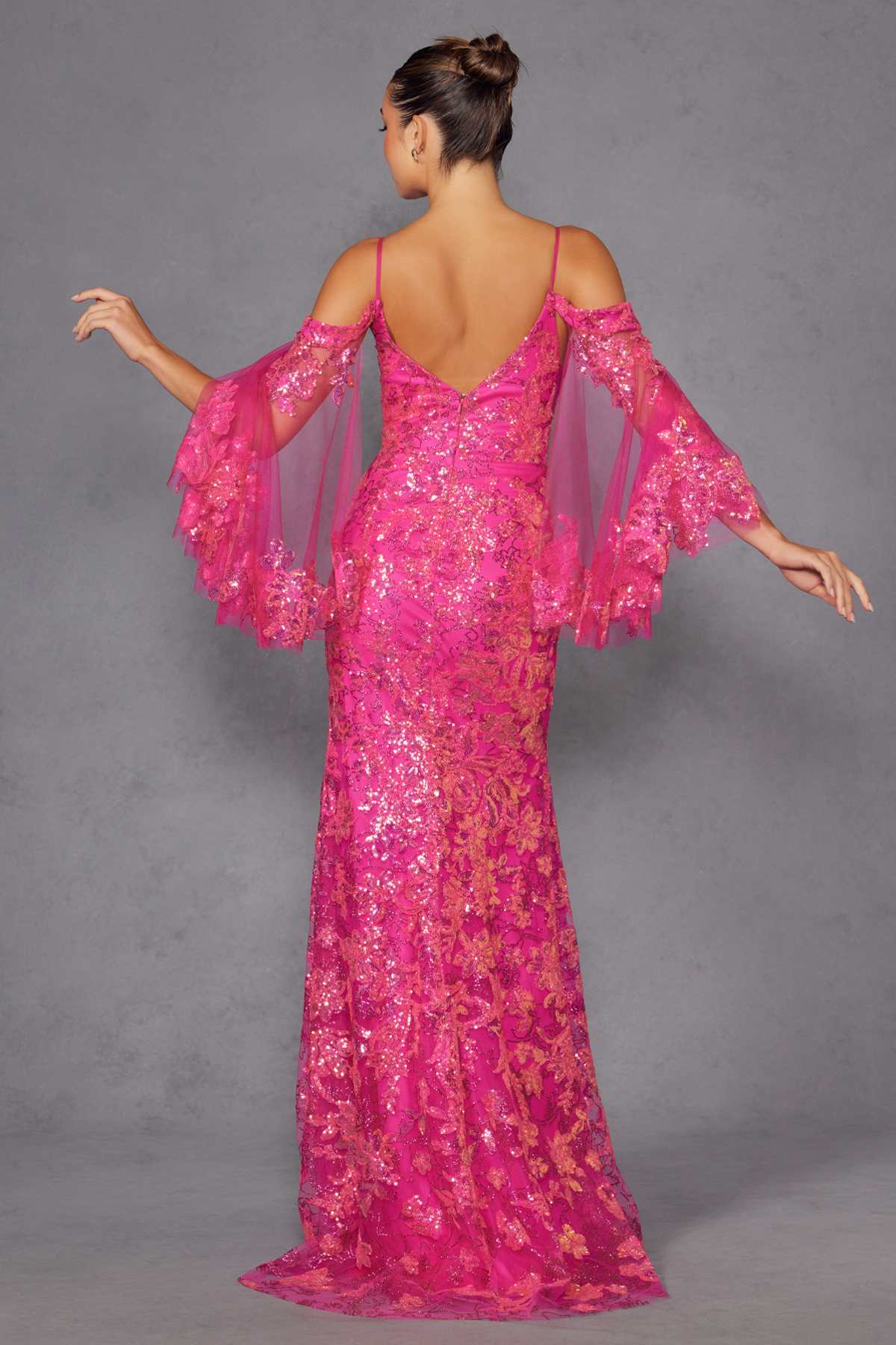 Fuchsia sequin fitted gown with open back and cold-shoulder sheer bell sleeves