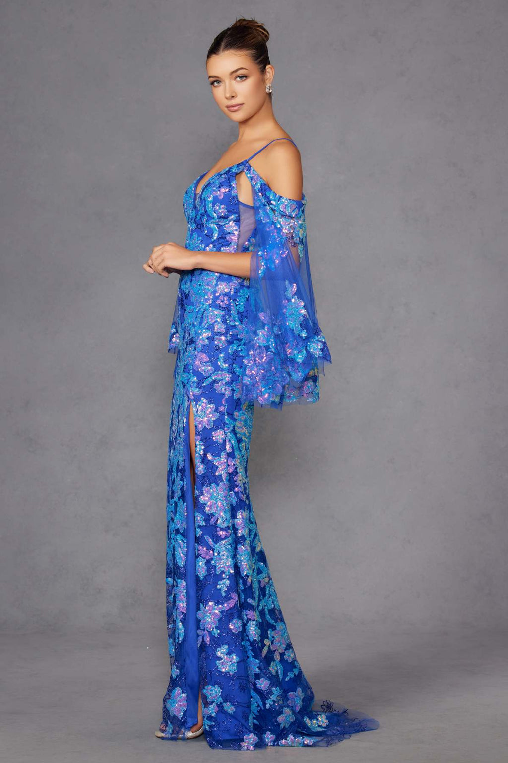 Blue sequin fitted gown with V neckline, cold-shoulder flutter sleeves, open back detail