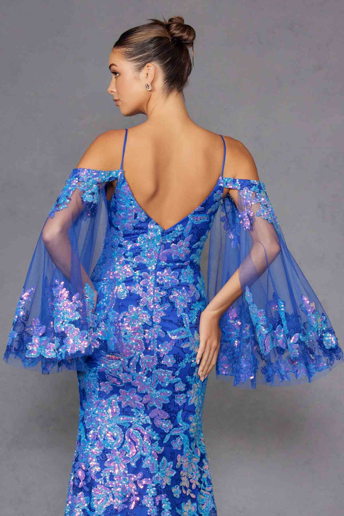 Blue sequin fitted gown with V neckline, cold-shoulder flutter sleeves, open back