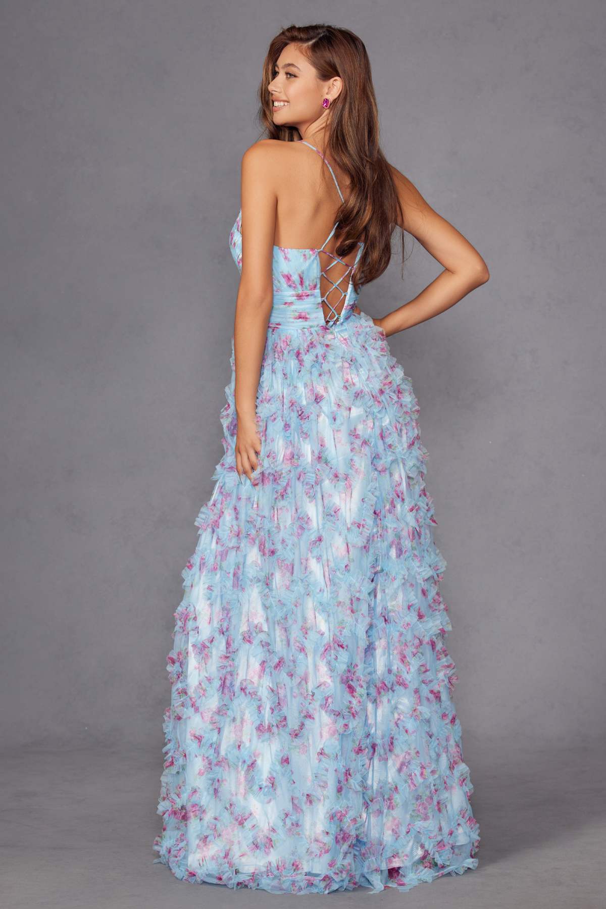 Blue floral print formal gown, V-back and spaghetti straps with tiered ruffle skirt