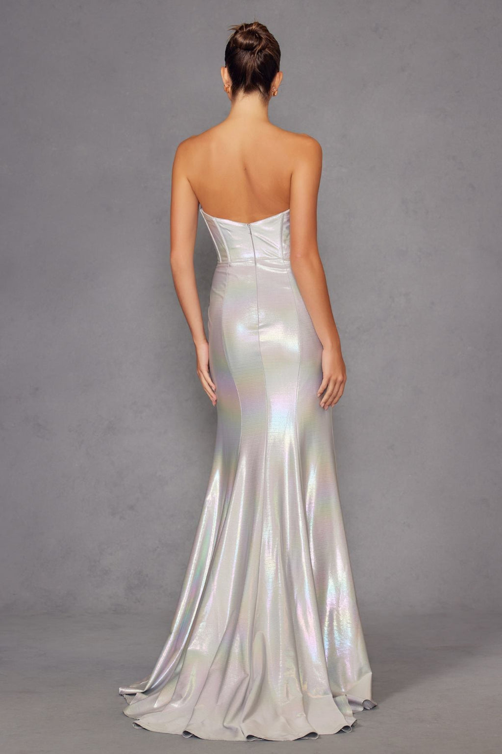 Iridescent strapless prom gown in silver satin, back view with open-back corset panel