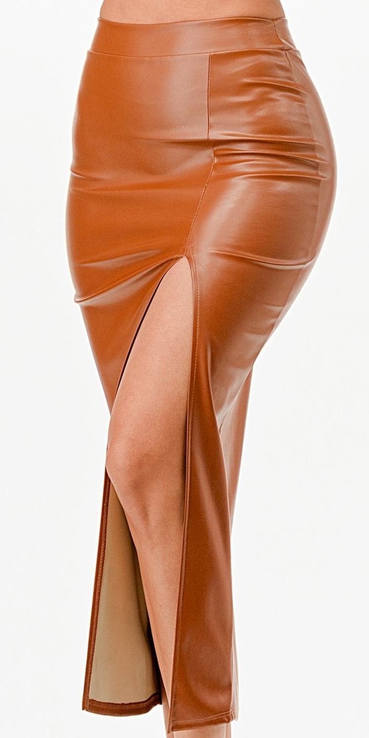 Mid-length brown faux leather pencil skirt with front slit and diagonal seam detail.