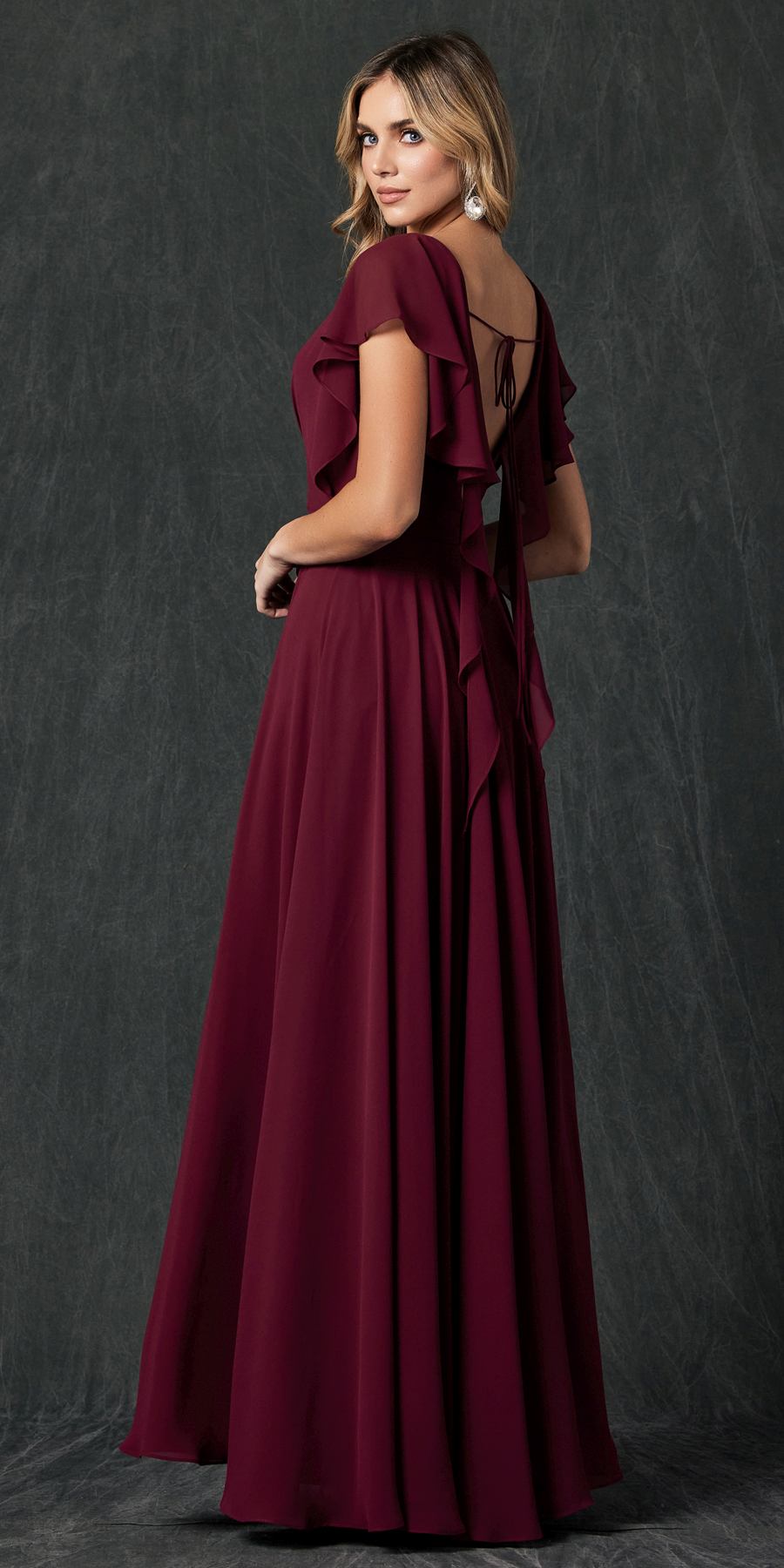 Burgundy formal dress with flutter sleeves and V-neck, draped bodice, cascading skirt