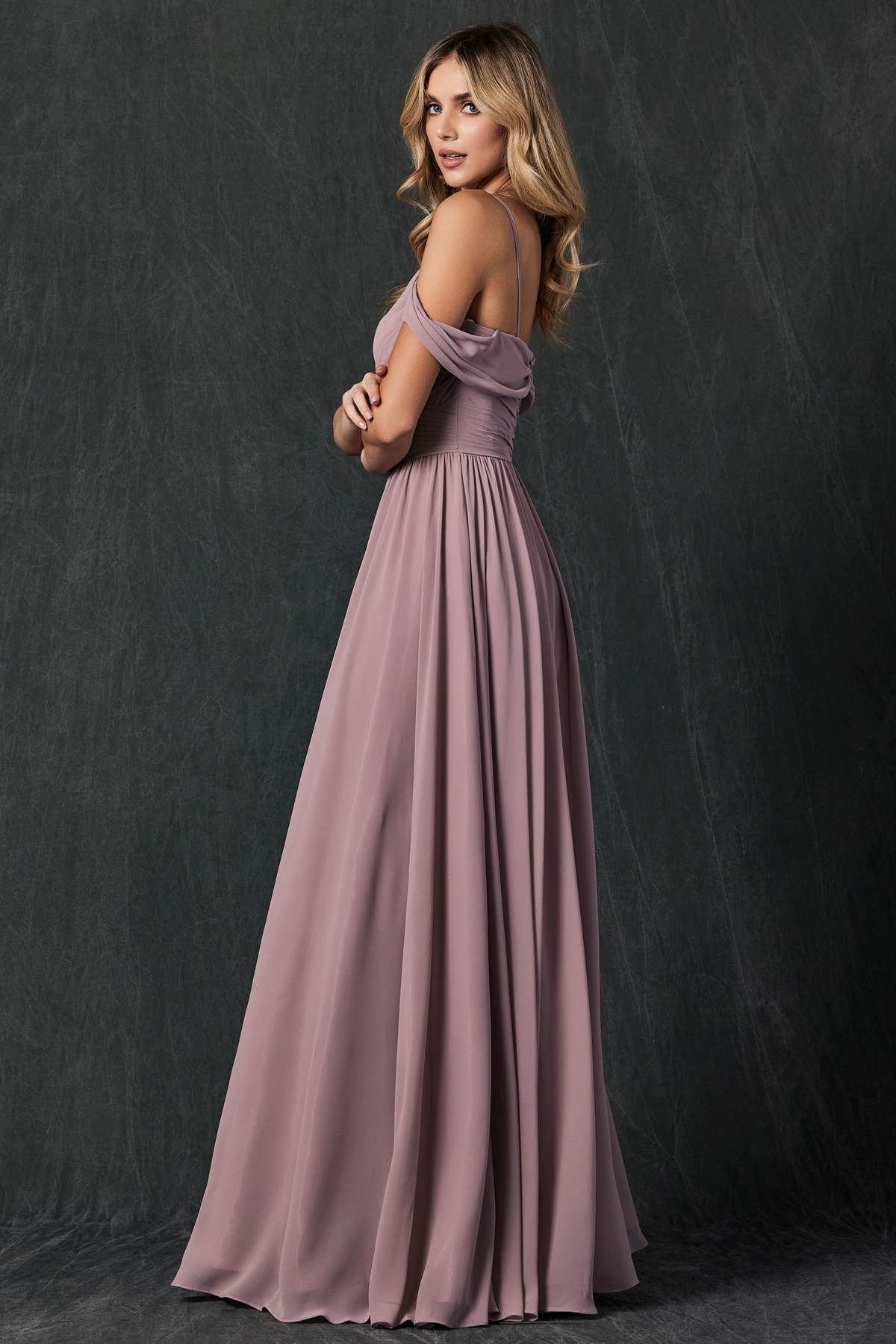 Mauve pleated off-shoulder formal dress with spaghetti straps and floor-length skirt