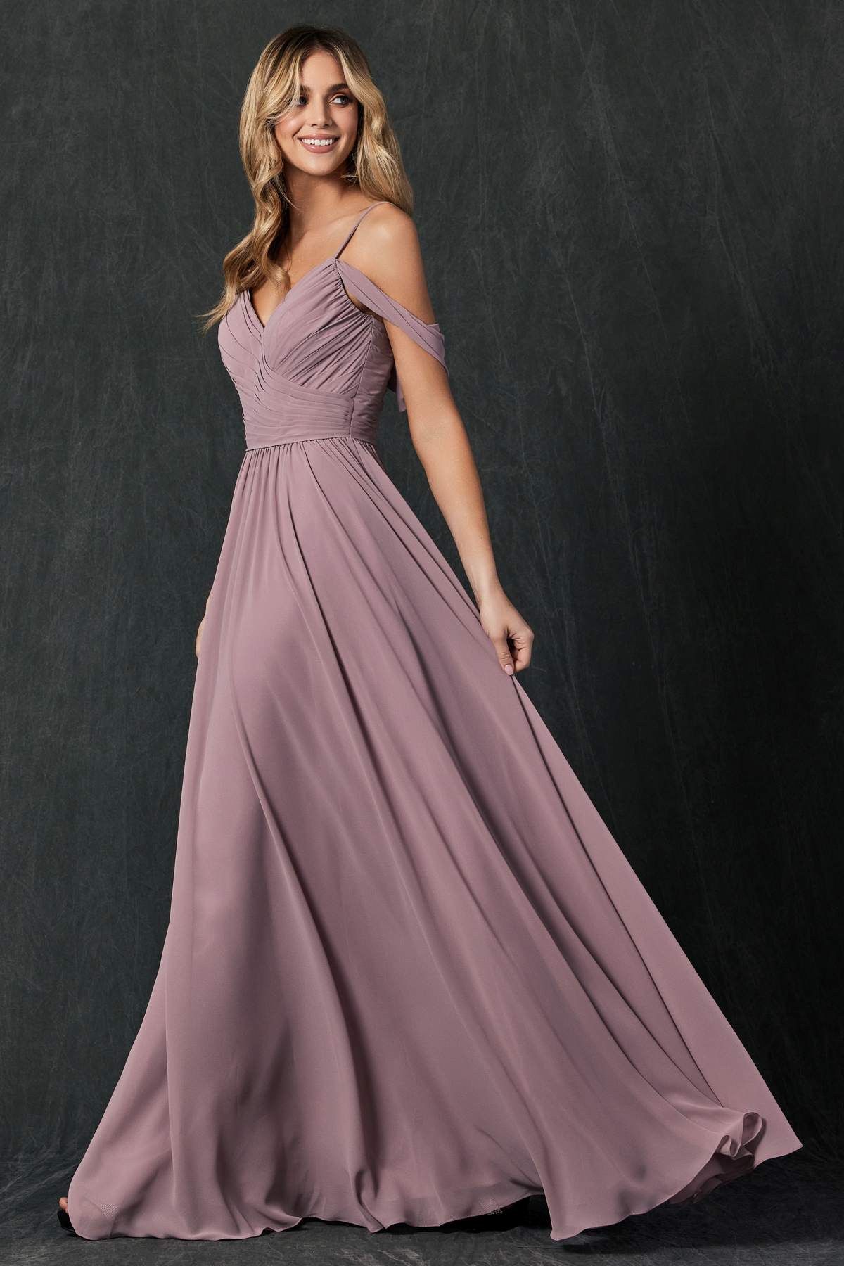 Mauve pleated off-shoulder formal dress with draped neckline and full length skirt