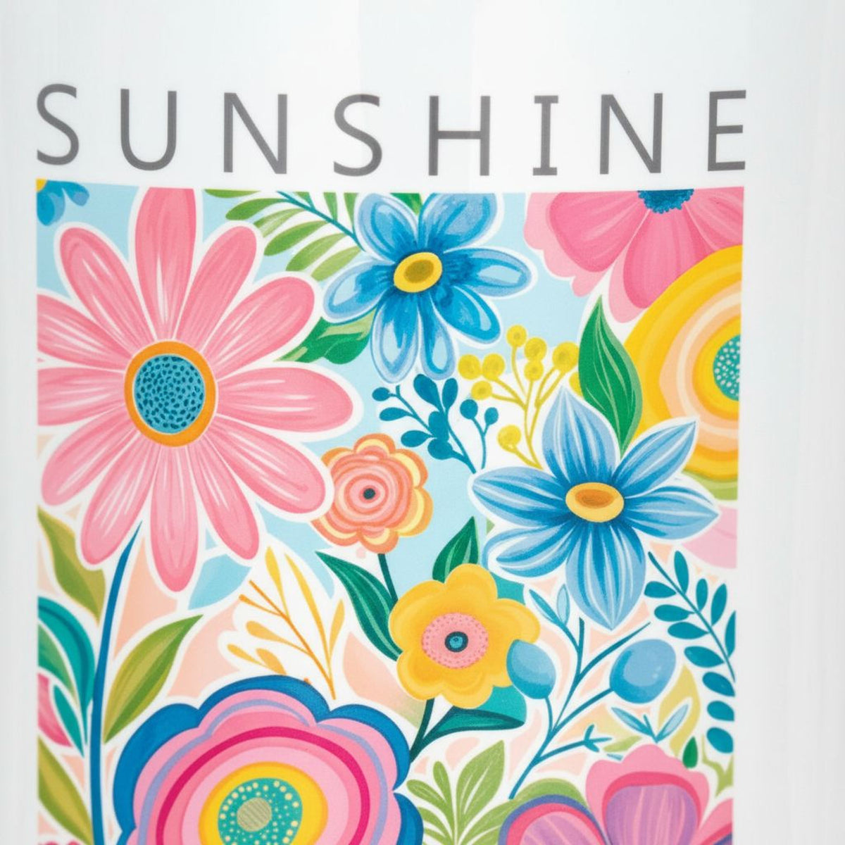 Close-up of colorful floral mug graphic with “SUNSHINE” lettering.