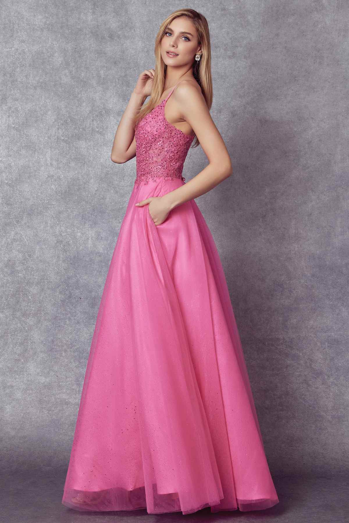 Fuchsia sparkle tulle ball gown with fitted beaded bodice and full pleated skirt