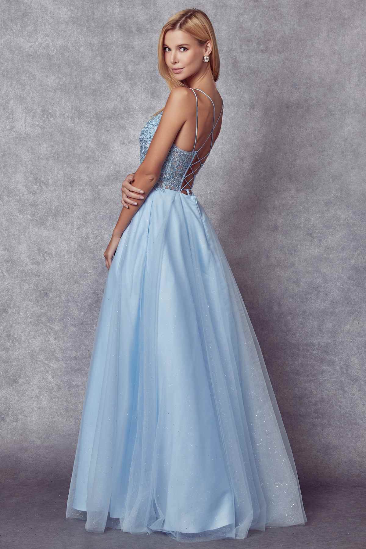 Ice blue sparkle tulle ball gown in a side view with fitted bodice and full skirt