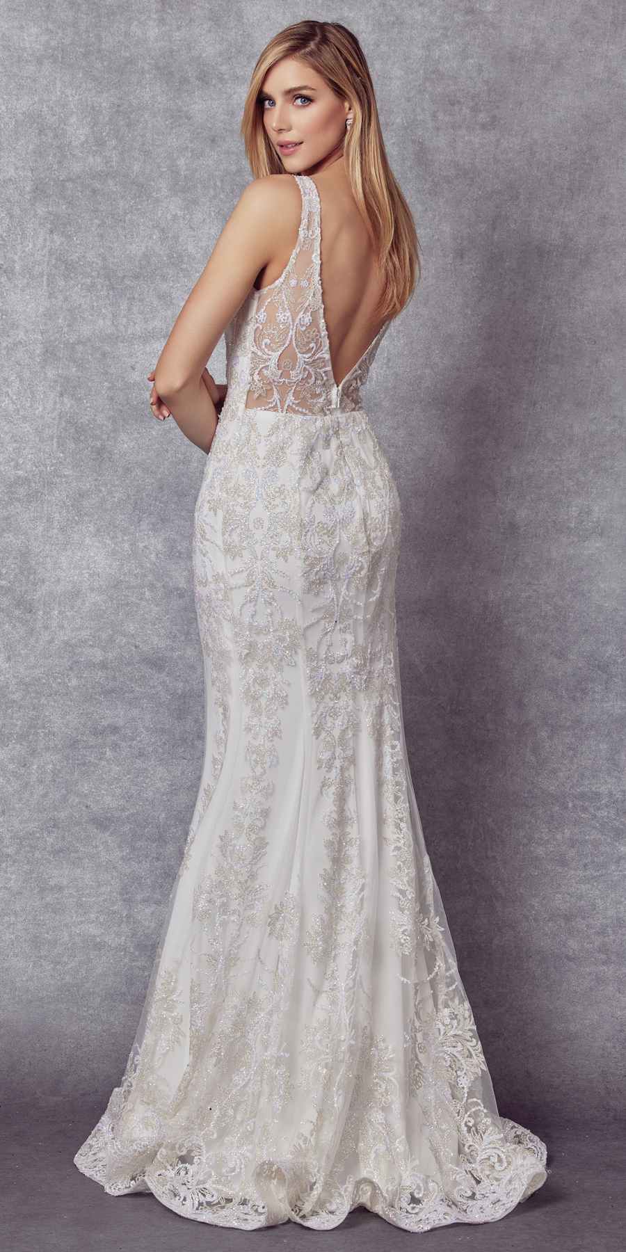 Off-white mermaid wedding dress with lace bodice and open-work floral pattern