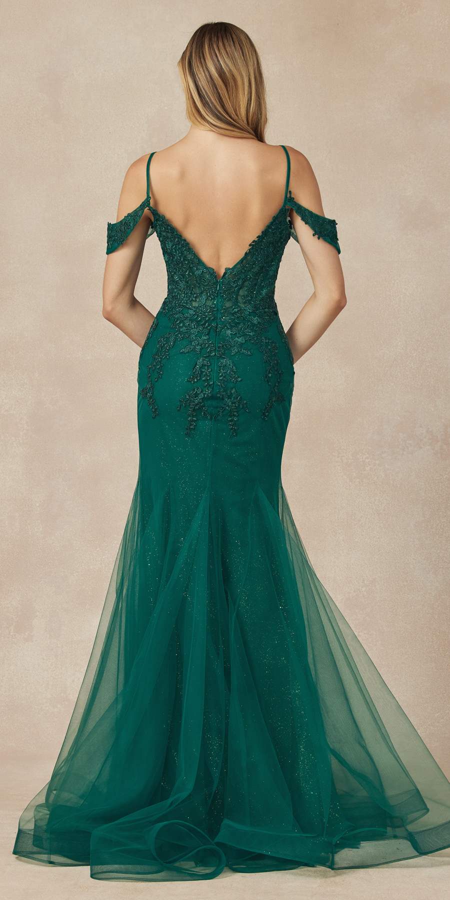 Emerald green mesh mermaid gown from back with lace bodice and off-shoulder sleeves