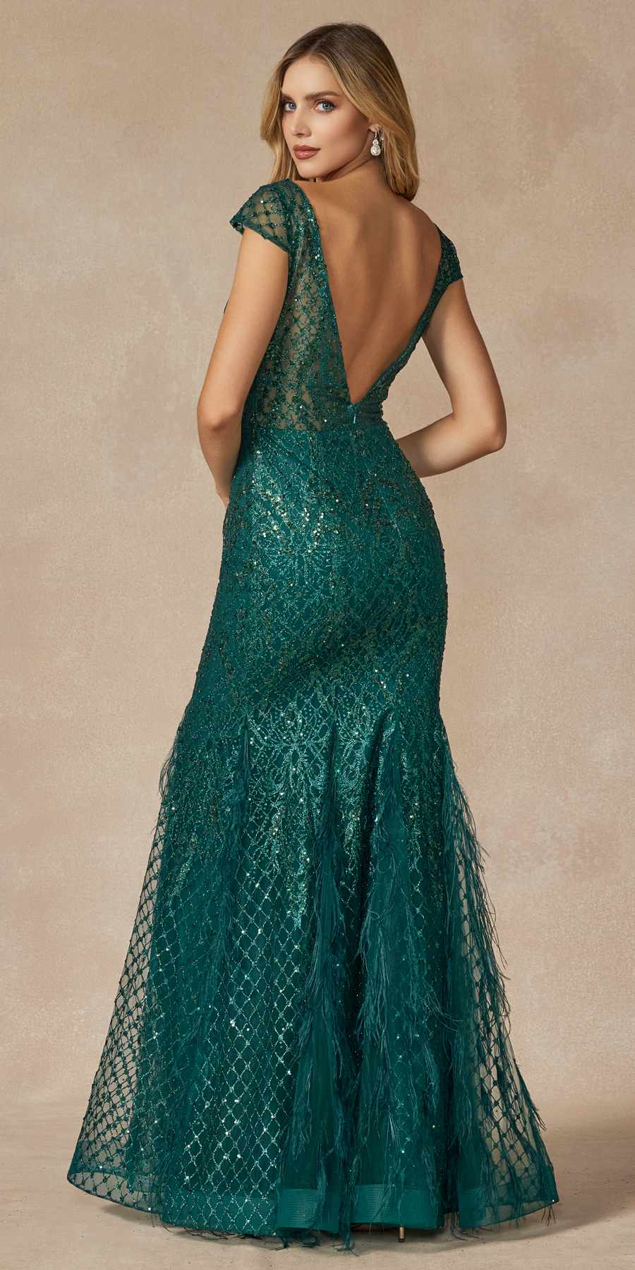 Emerald green fitted prom dress with V-neck, cap sleeves, open-back detail, mermaid skirt