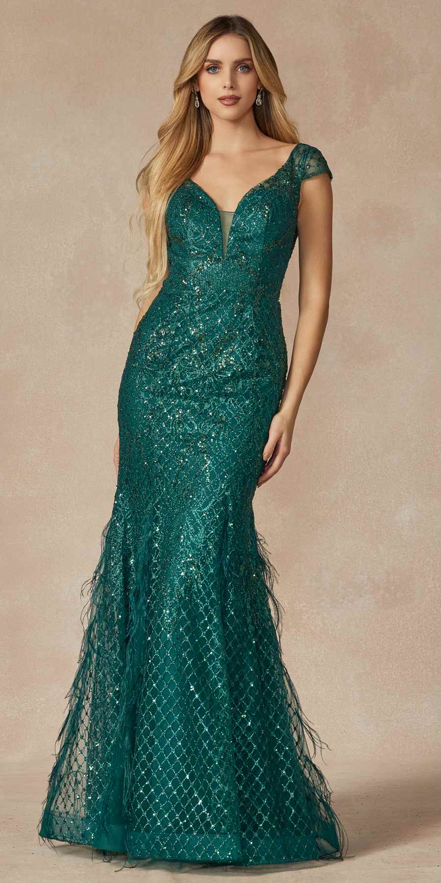 Emerald green fitted prom dress with V-neck, cap sleeves, and sequined mermaid hem
