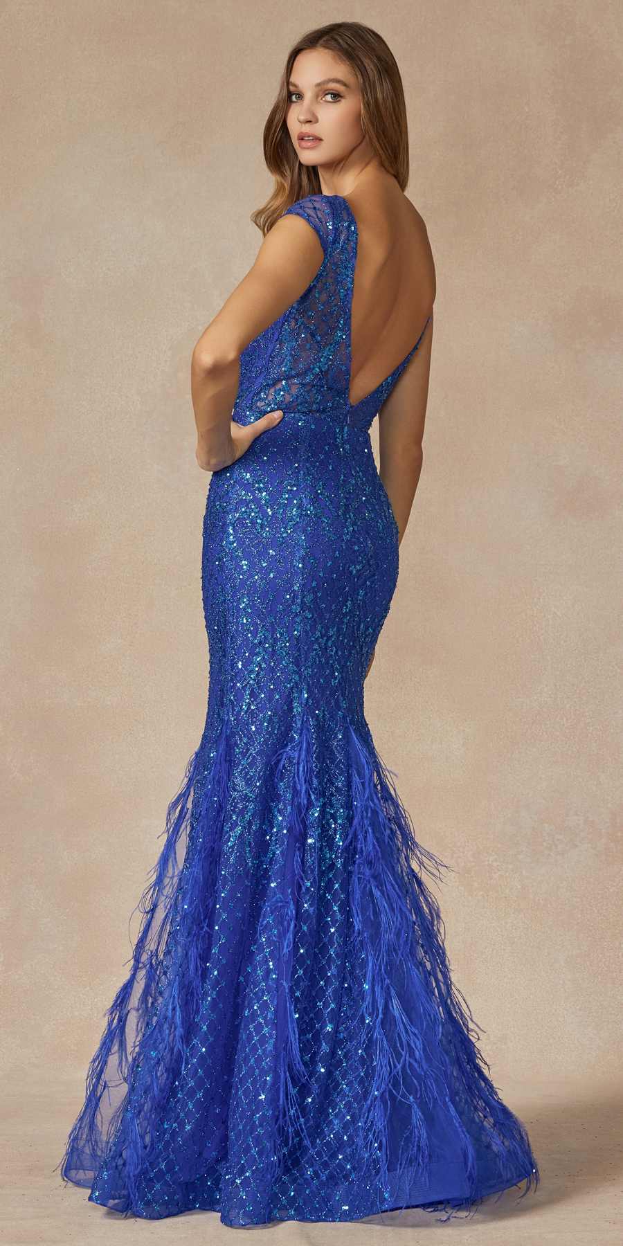 Royal blue sequined fitted prom dress with open back and feathered floor-length skirt