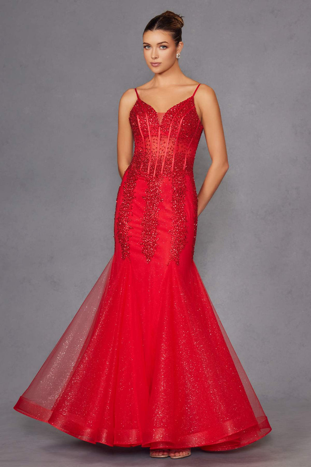 Red embellished mermaid gown with fitted corset and thin straps, studio full view