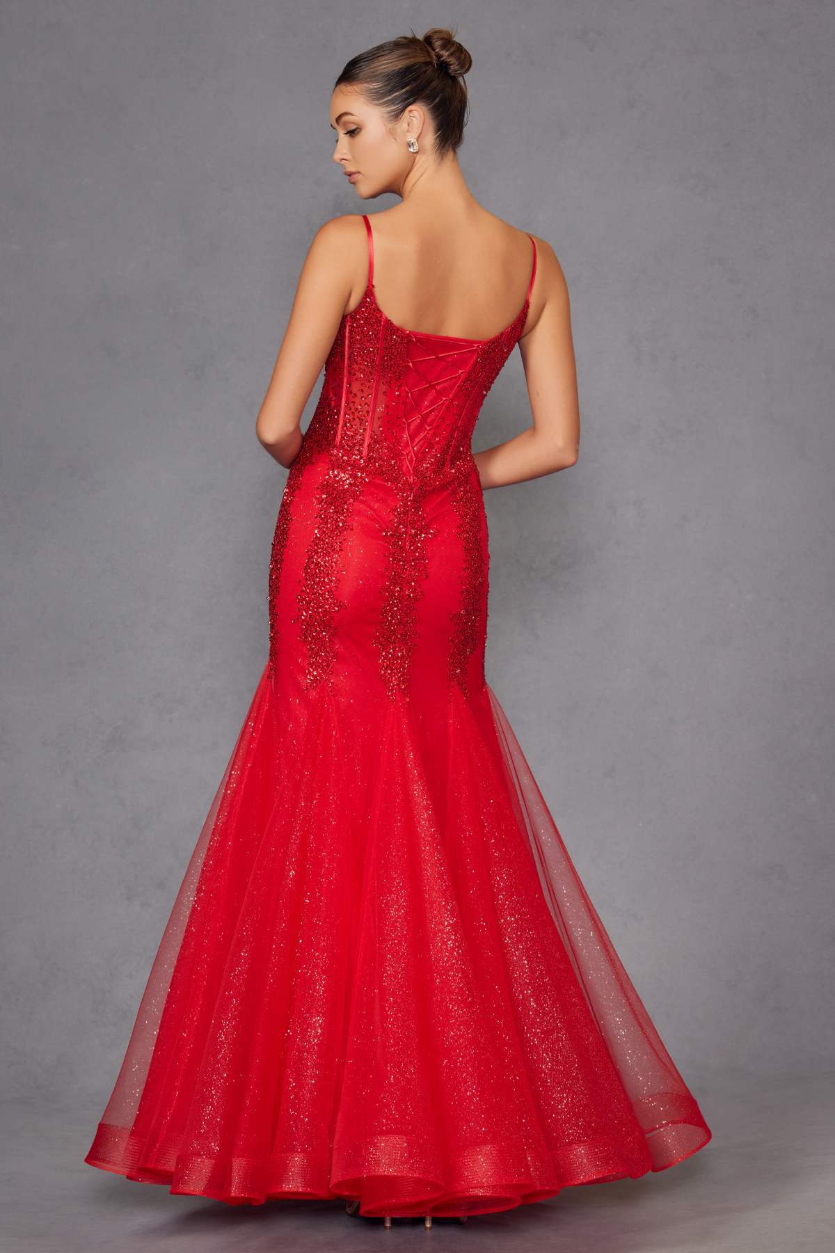 Red embellished mermaid gown with fitted corset and thin straps, back/side view