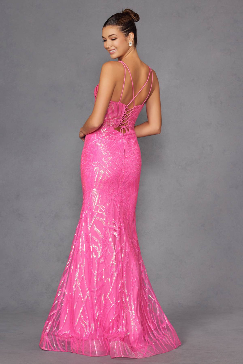 Fuchsia sequin corset gown with open back and thin spaghetti straps