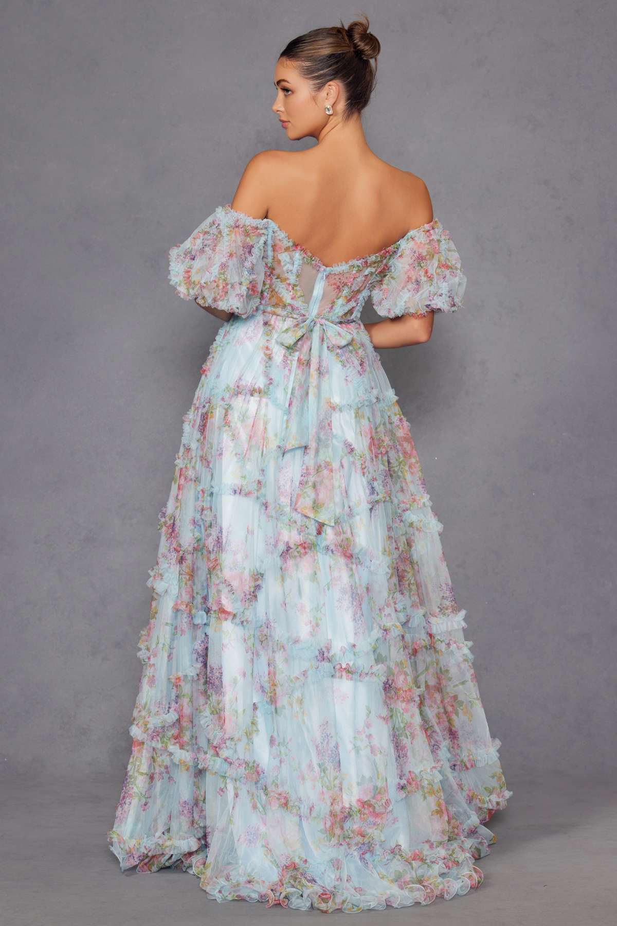 Blue floral off-shoulder sweetheart ruffled A-line gown, back view, tiered skirt