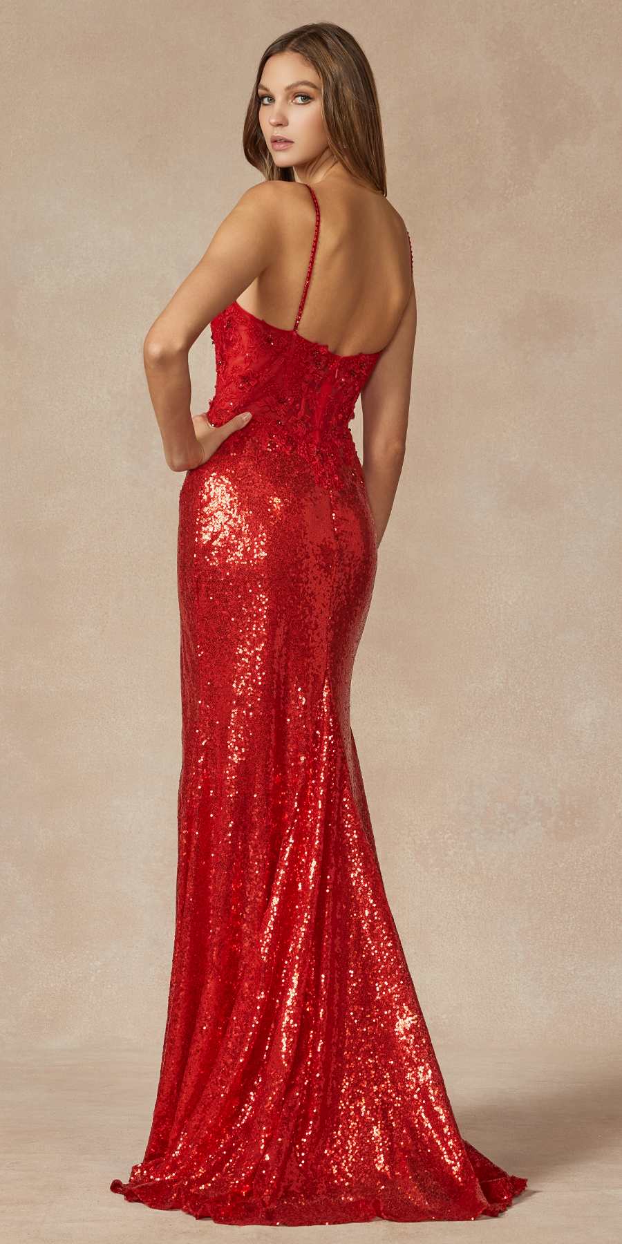 Red sequin fitted long prom gown with spaghetti straps and front thigh slit