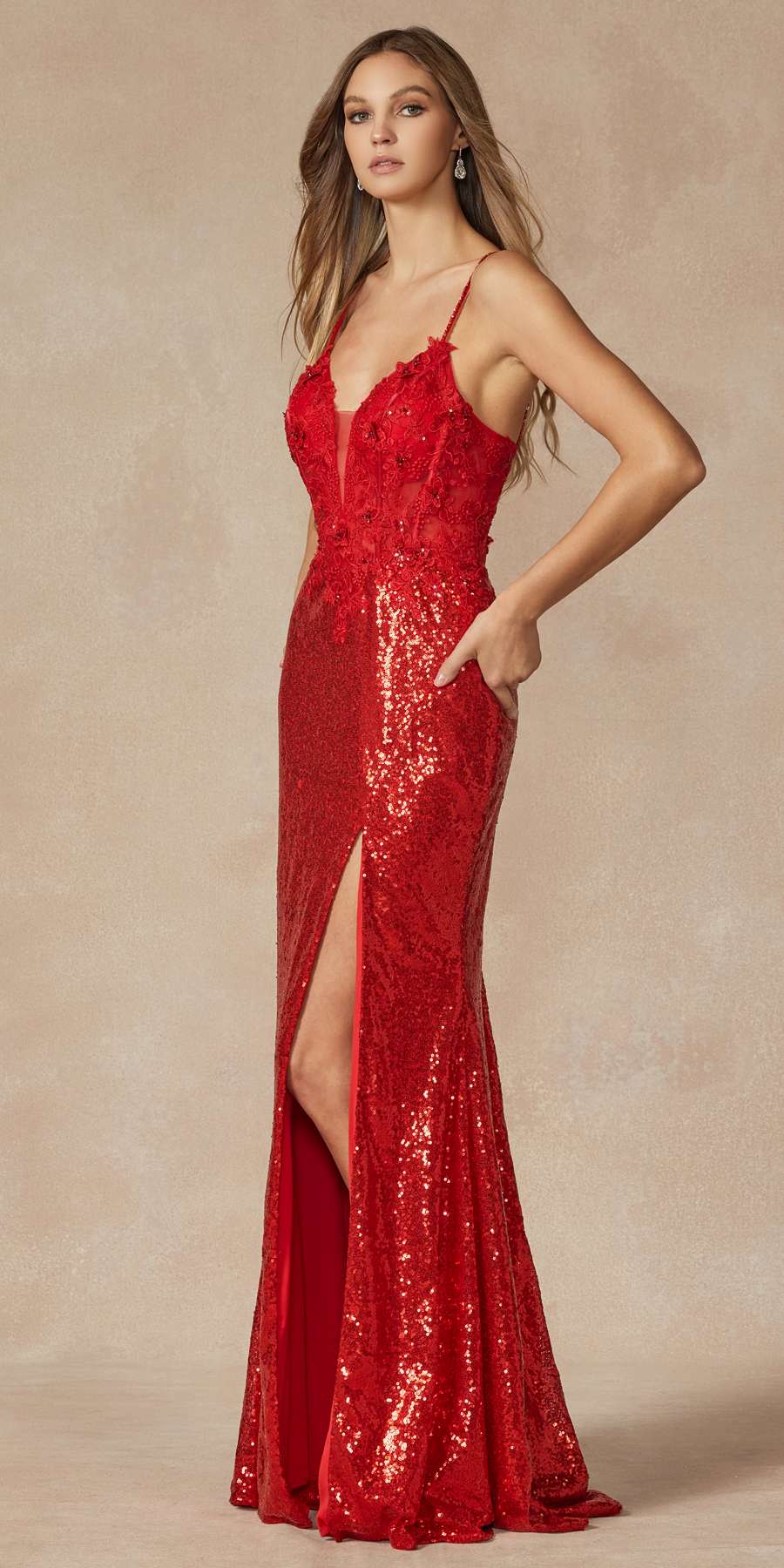 Red sequin long prom gown with spaghetti straps, sweetheart neckline, and front slit