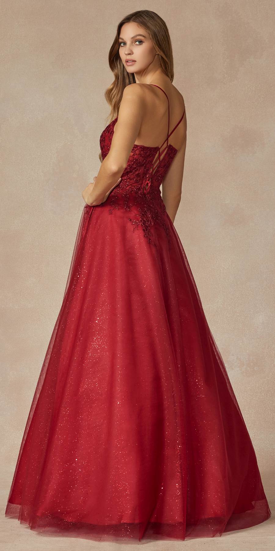 Burgundy lace corset prom gown, open back and spaghetti straps, flowing A-line skirt