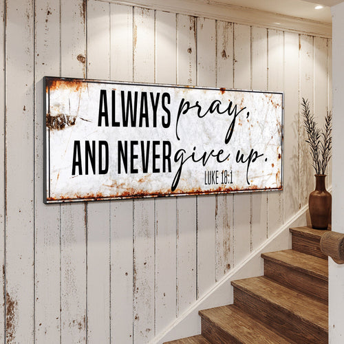 Wall canvas sign "Always pray, and never give up" with Luke 18:1 on frame