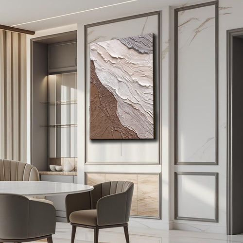 Abstract wall art canvas with white wave relief over brown textured area, framed