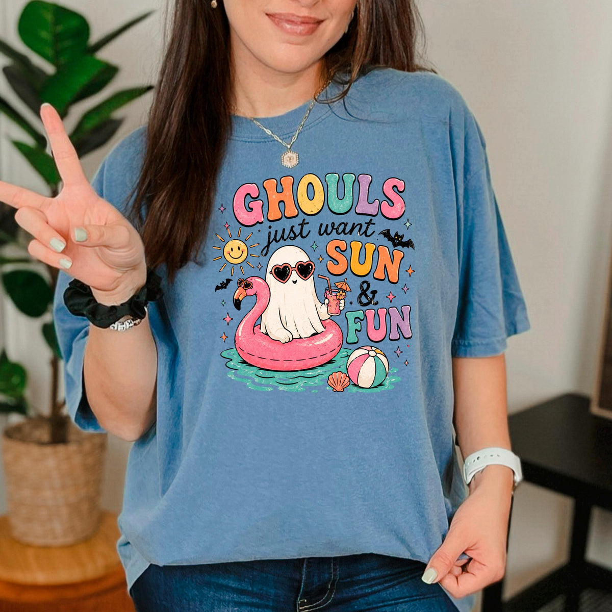 Blue crew-neck T-shirt with “GHOULS just want SUN & FUN” graphic