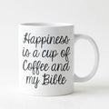 White ceramic coffee mug with black script: 'Happiness is a cup of coffee and my Bible'