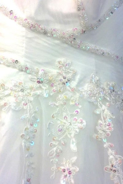 Light tulle fabric with multicolor embroidered floral sequins and beaded patterns
