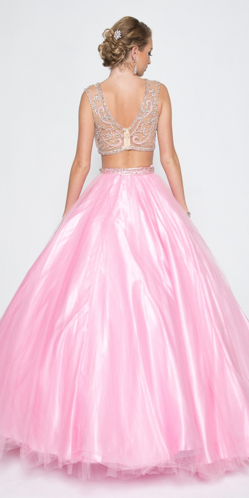 Light pink tulle quinceanera dress, back view with embellished bodice and flared skirt