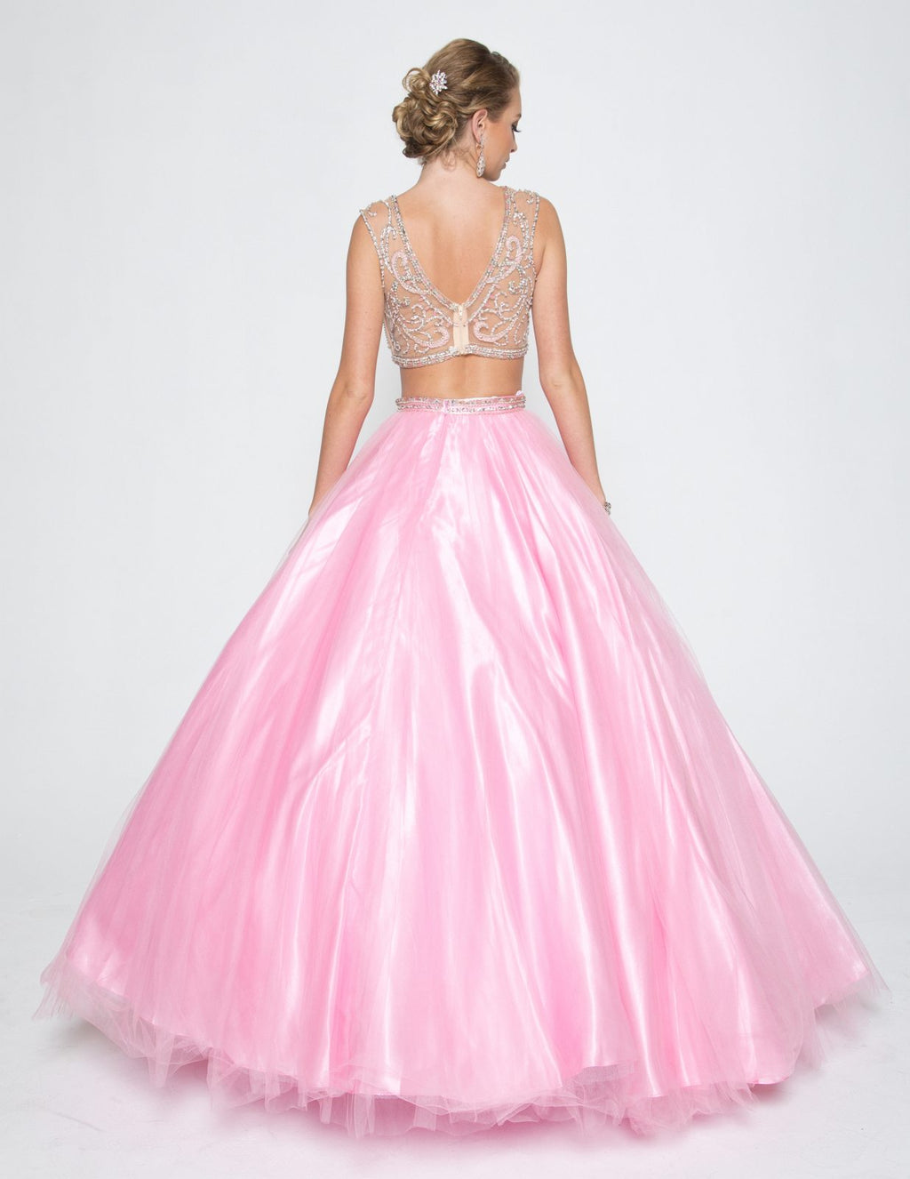 Light pink tulle quinceanera dress, back view with embellished V back and full skirt