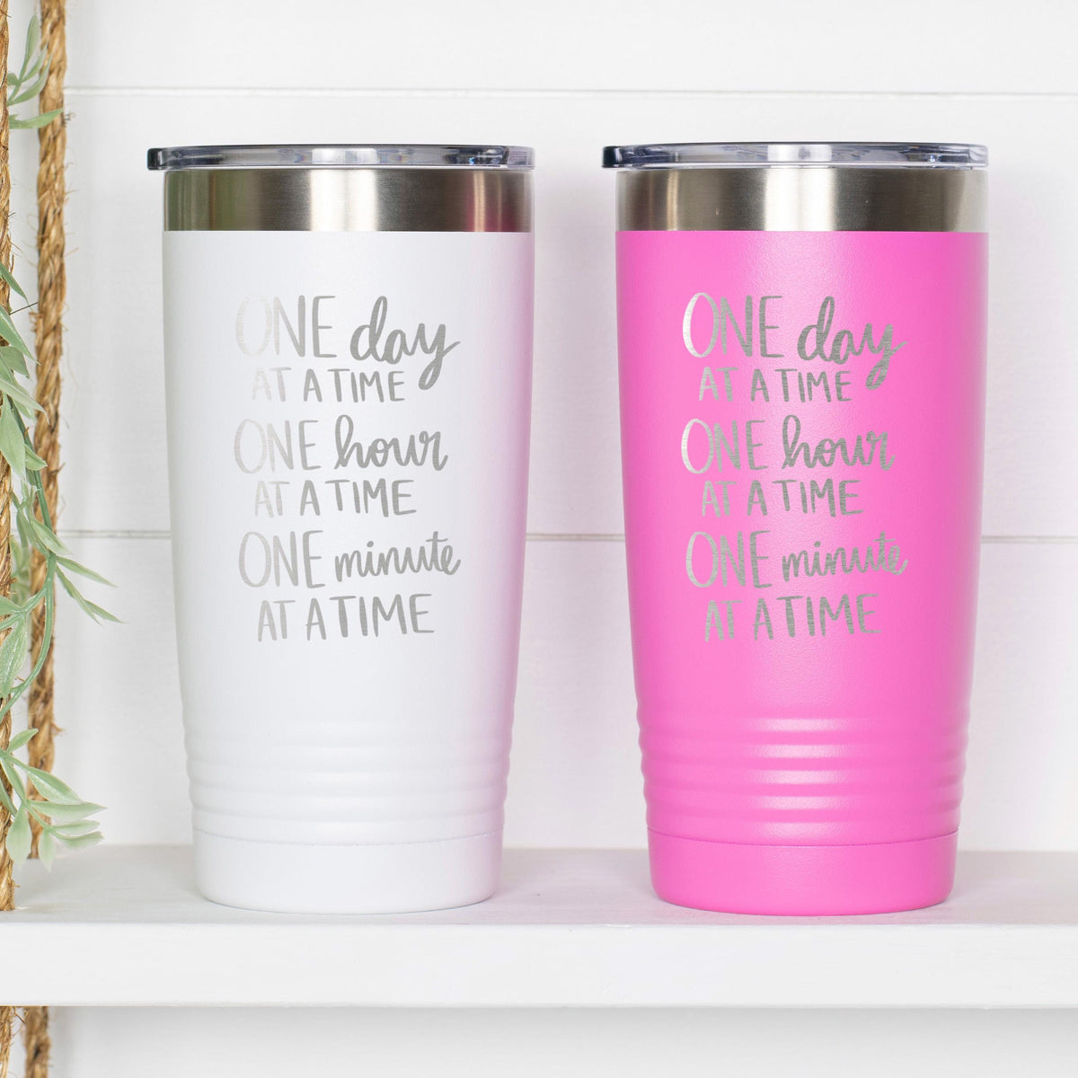 Pair of insulated tumblers: white and pink, each with “One day at a time” print