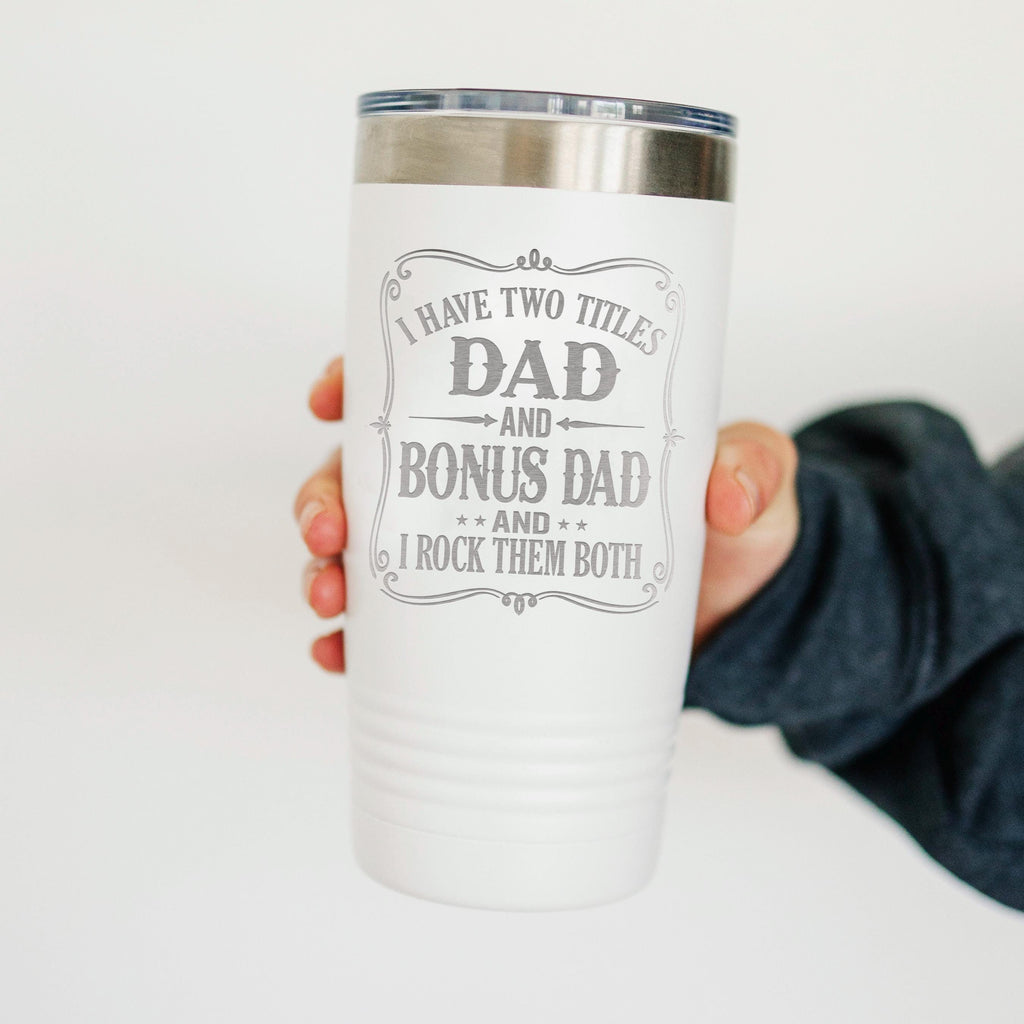 White insulated travel tumbler with silver lid and 'Dad and Bonus Dad' quote graphic