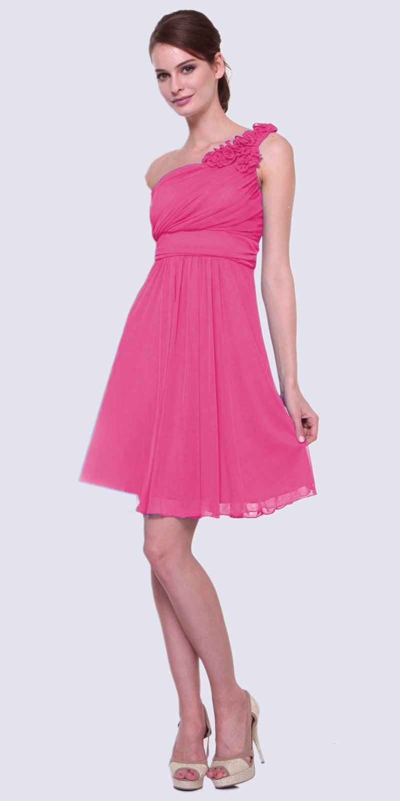One-shoulder chiffon dress in hot pink with ruffle detail and gathered waist, knee-length.