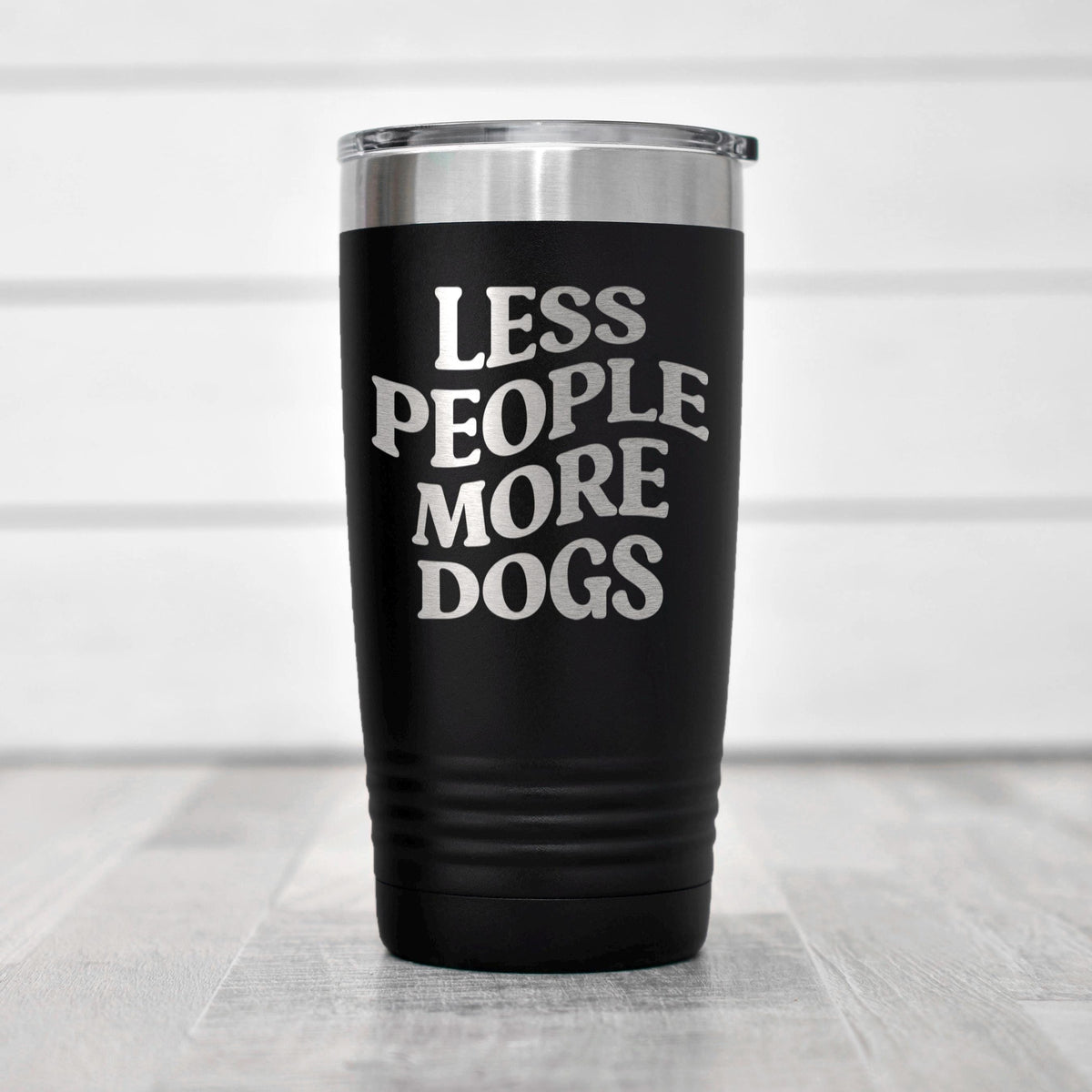 Black insulated tumbler with clear lid; “LESS PEOPLE MORE DOGS” on the front.
