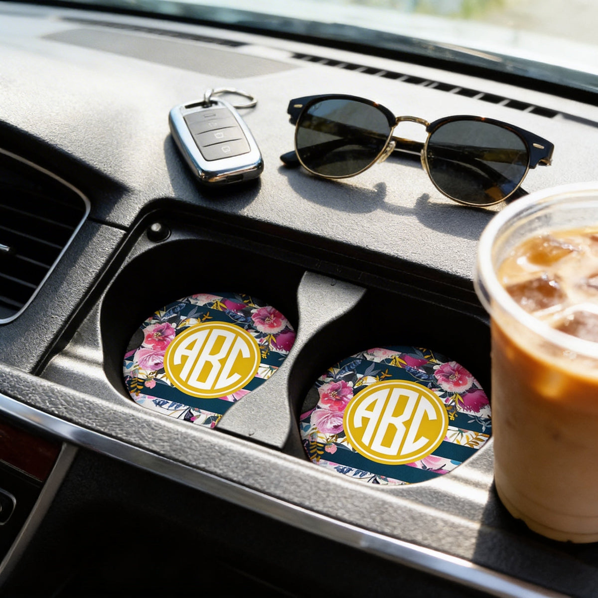 Set of 2 car coasters in cup holders, navy floral pattern with gold monogram