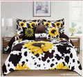 King size comforter set with black-and-white cowprint and yellow sunflower pillows