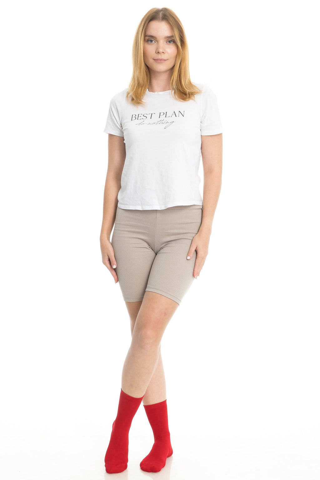 Women’s bamboo crew socks in red on model, mid-calf length with ribbed cuff