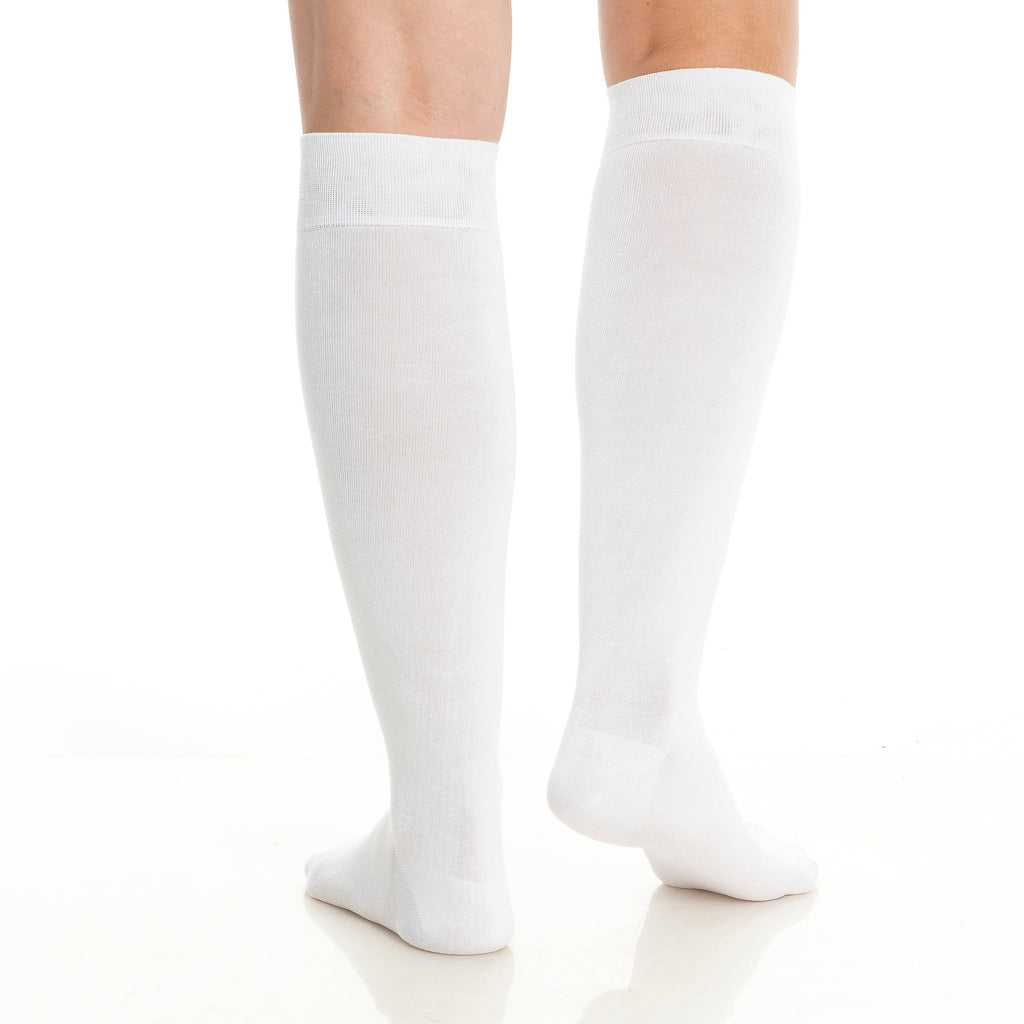 White knee-high socks on legs, full length view