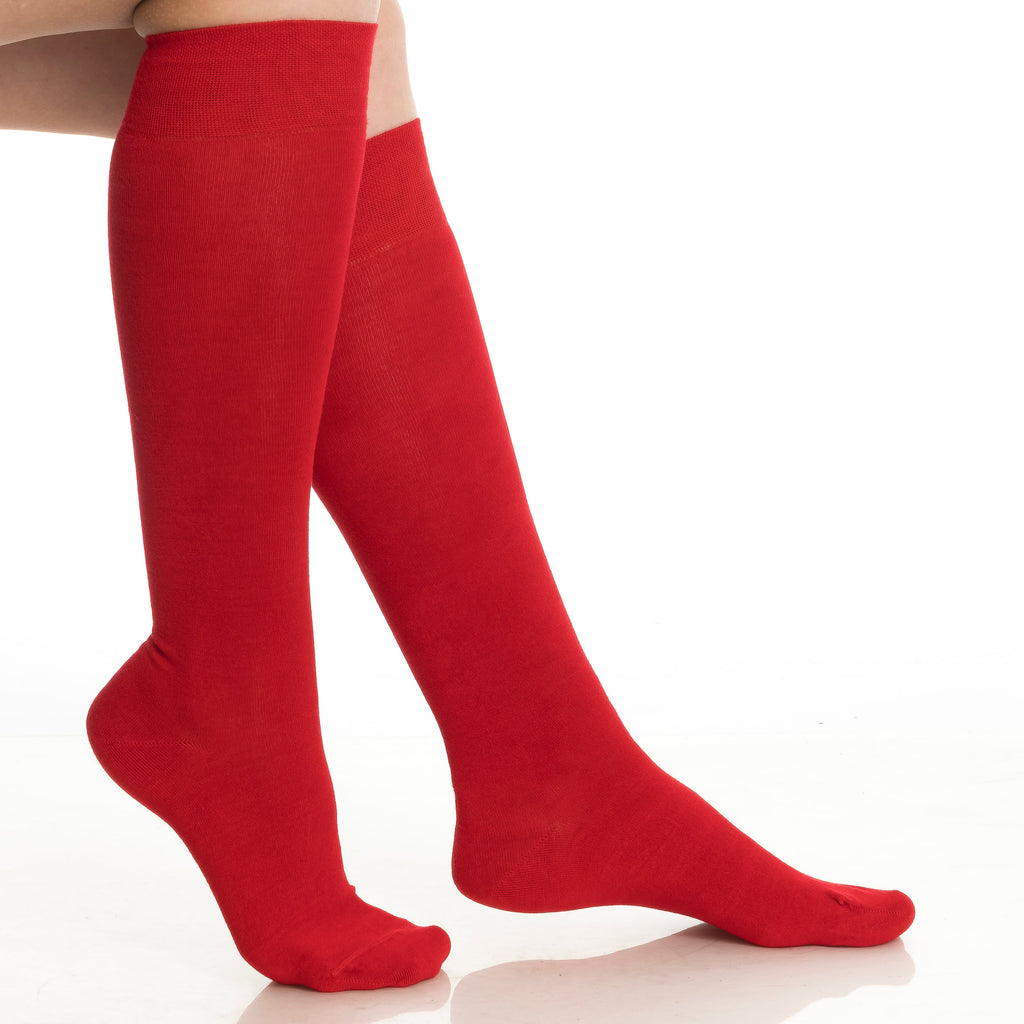 Red knee-high socks, close-up from mid-calf to toe