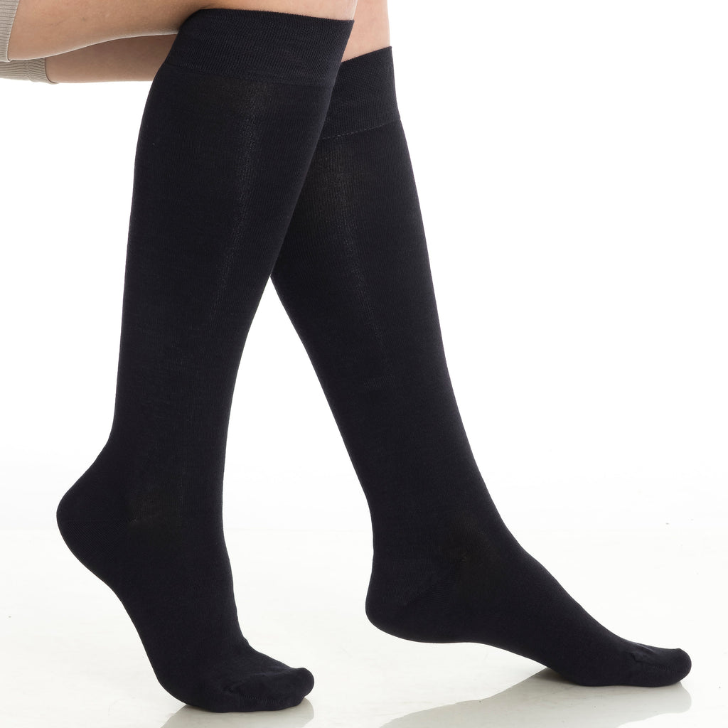 Women’s bamboo knee-high socks in black, angled leg view with smooth knit