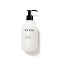 Body lotion bottle with black pump, white bottle labeled Lemon, Geranium & Clary Sage