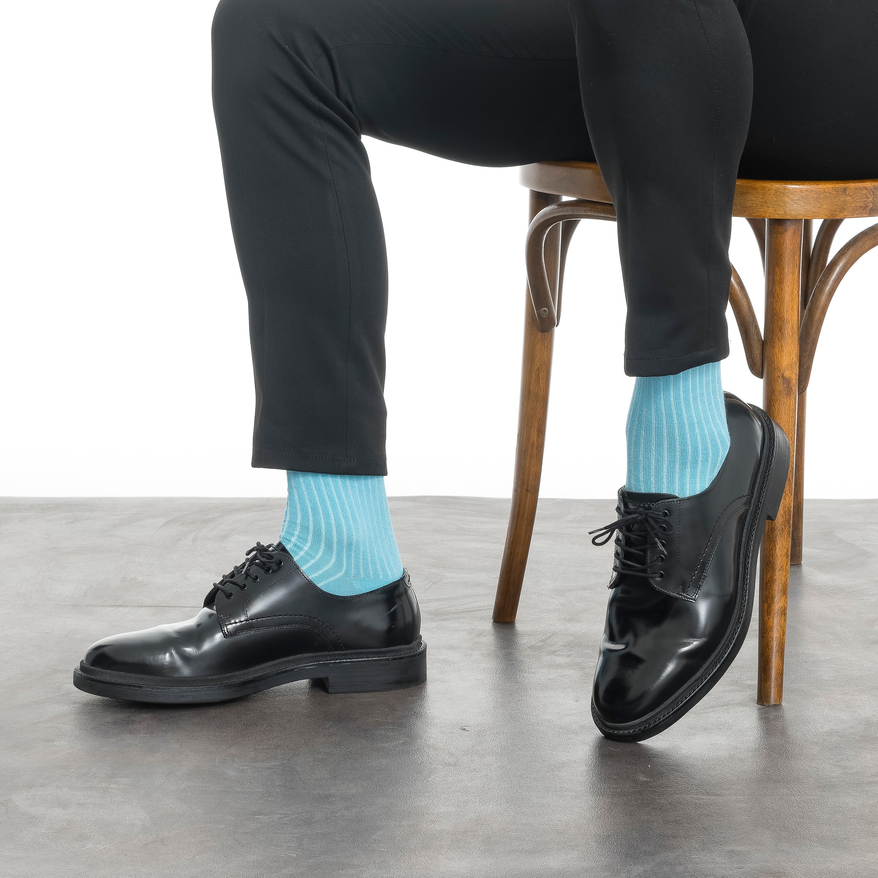 Men's bamboo dress socks, light blue crew socks worn with black dress shoes