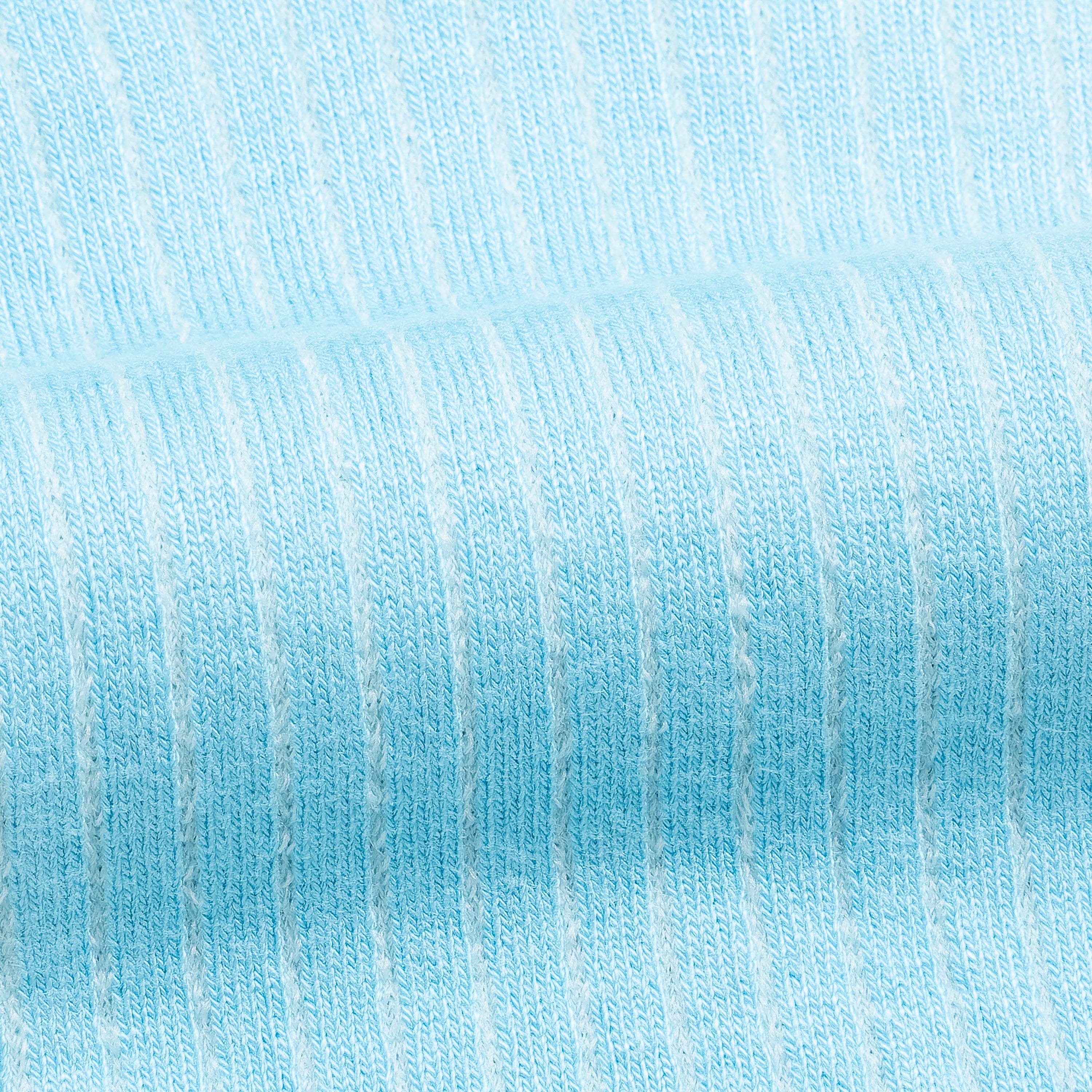 Men's bamboo dress socks fabric, light blue knit texture close-up